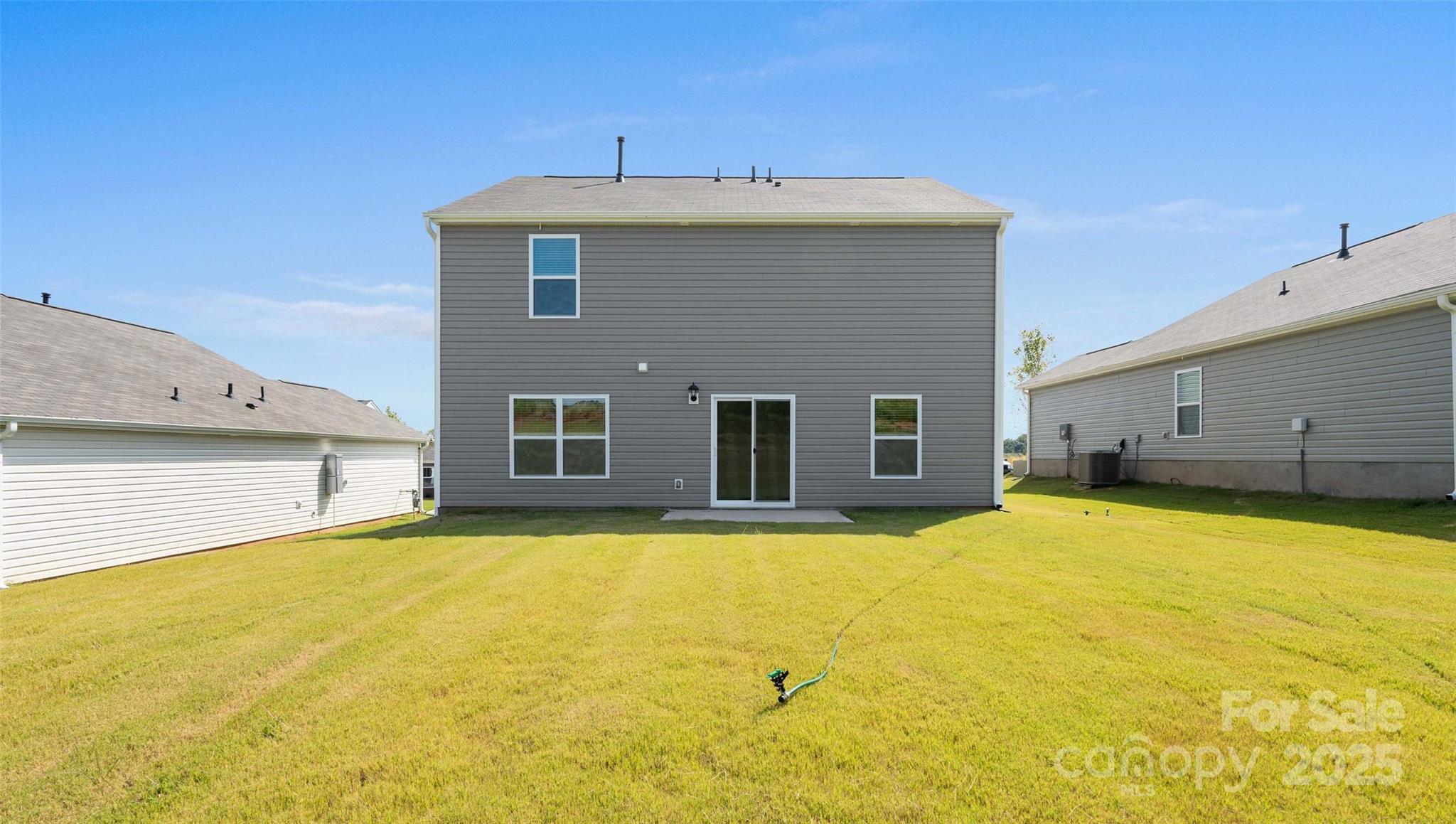 205 Callie River Clyde, NC 28721 - Photo 19 of 20 a view of a house with pool and a yard