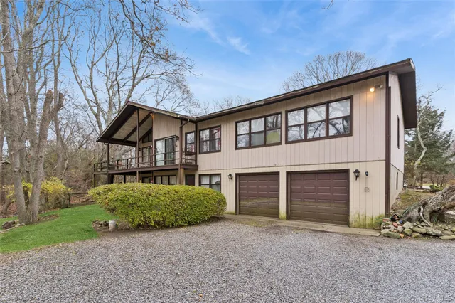 front view of a house with a street