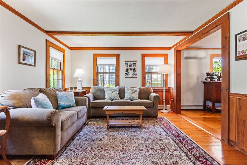 64 Beaten Road Dennis, MA 02639 - Photo 6 of 18 a living room with furniture and a rug