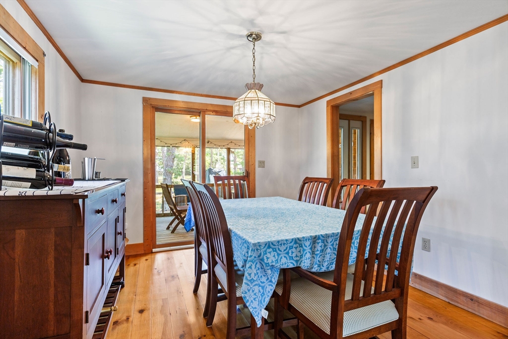 64 Beaten Road Dennis, MA 02639 - Photo 9 of 18 a view of a dining room with furniture window and wooden floor