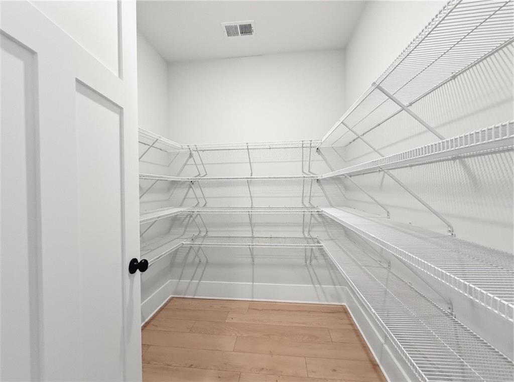 115 Palisade Drive Rydal, GA 30171 - Photo 32 of 74 a view of a room with racks on the wall