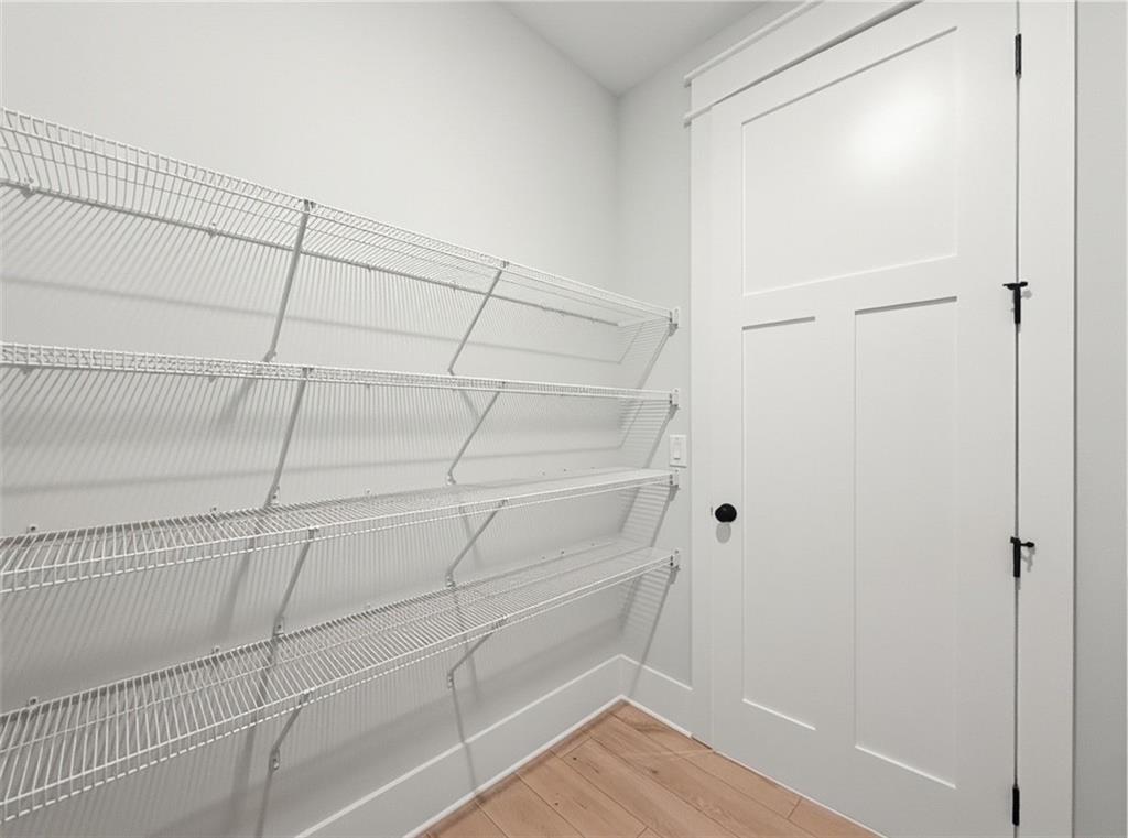 115 Palisade Drive Rydal, GA 30171 - Photo 33 of 74 a view of a room with racks on the wall