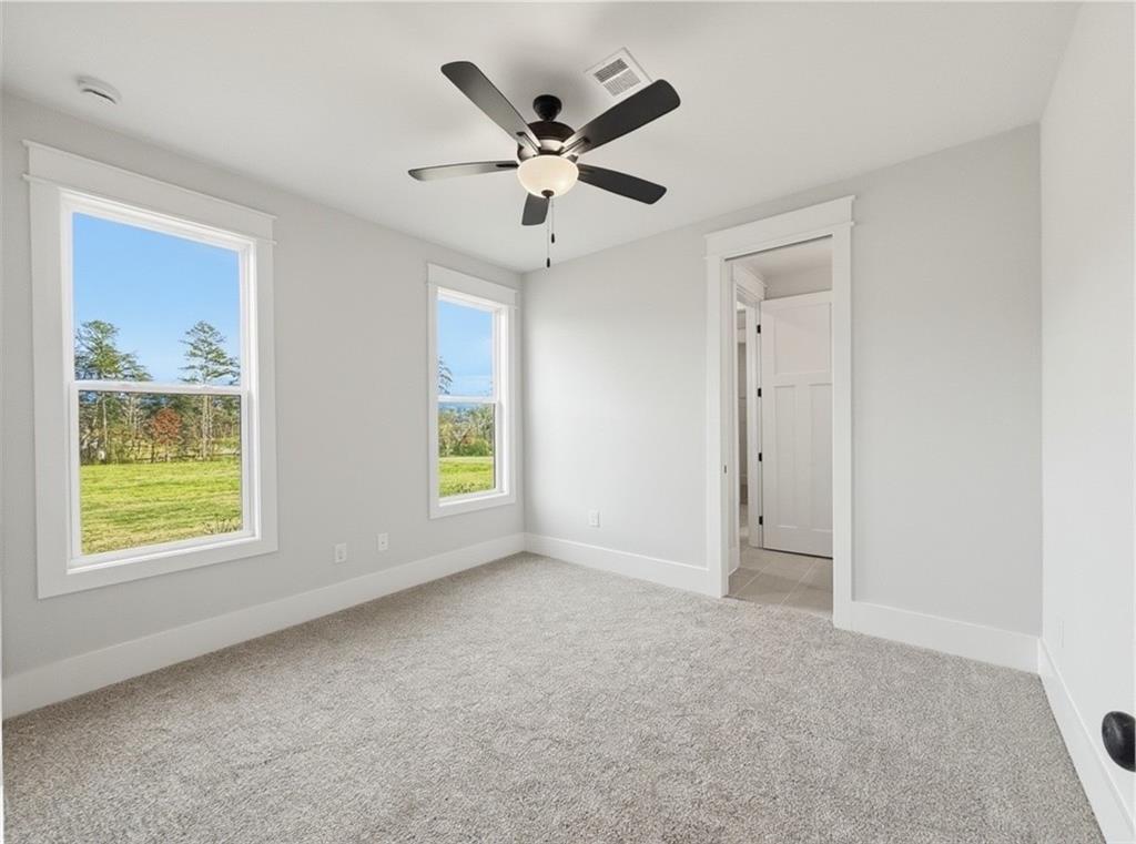 115 Palisade Drive Rydal, GA 30171 - Photo 59 of 74 a view of an empty room with a window