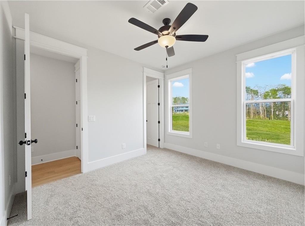 115 Palisade Drive Rydal, GA 30171 - Photo 60 of 74 a view of an empty room with a window