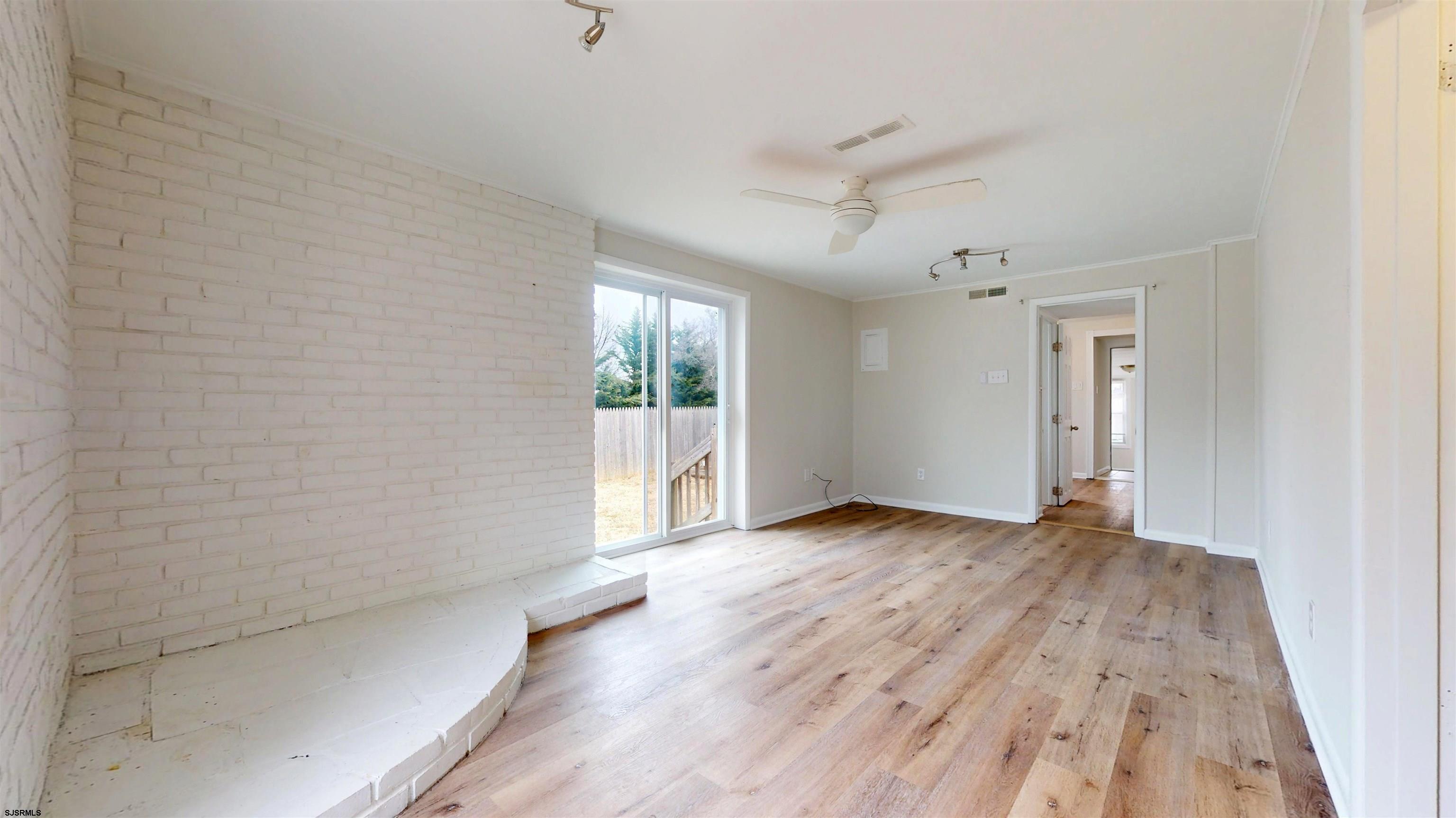 4 East Mill Road Northfield, NJ 08225 - Photo 20 of 49 wooden floor in an empty room with a window