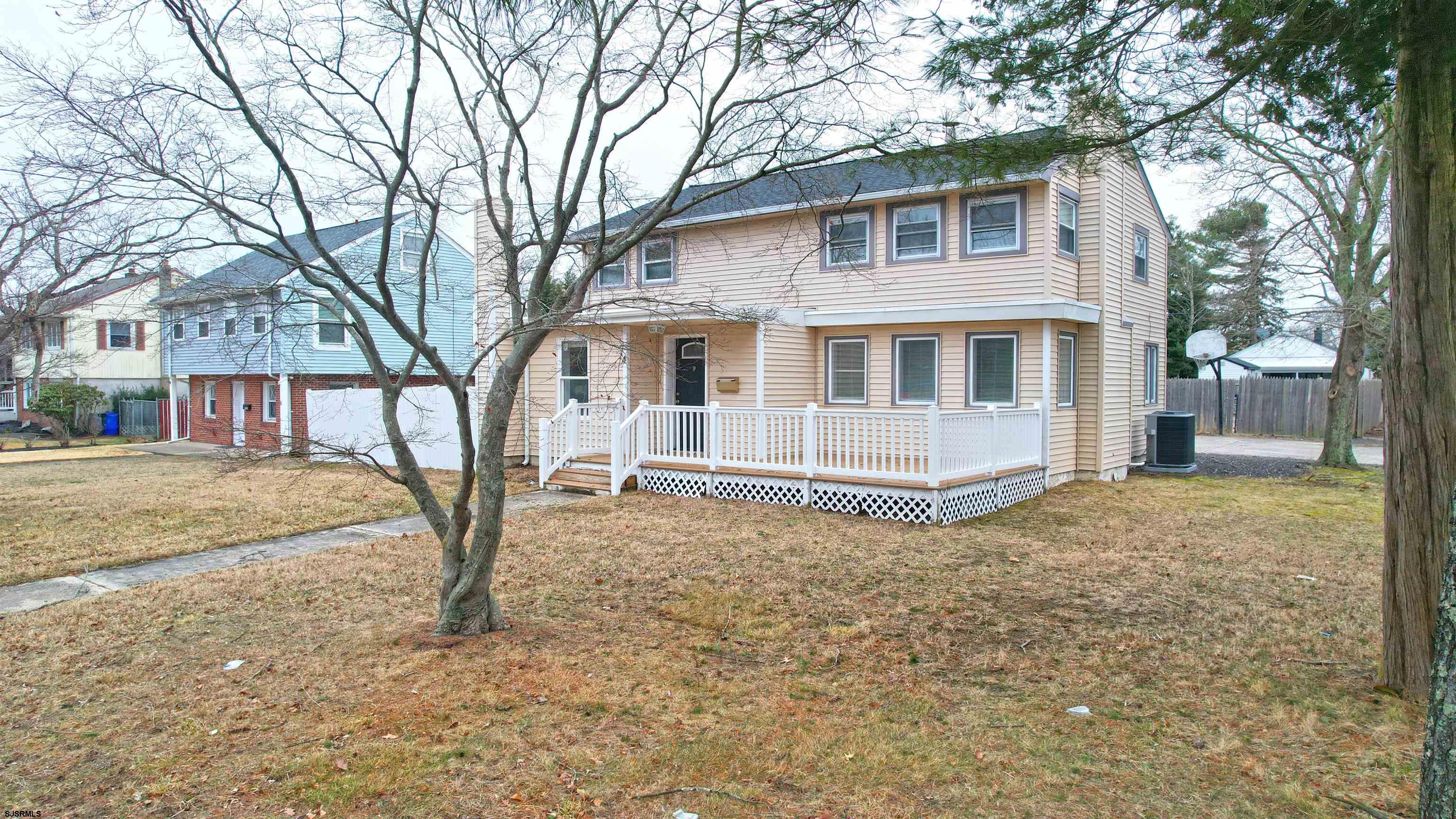4 East Mill Road Northfield, NJ 08225 - Photo 2 of 49 a house with trees in front of it