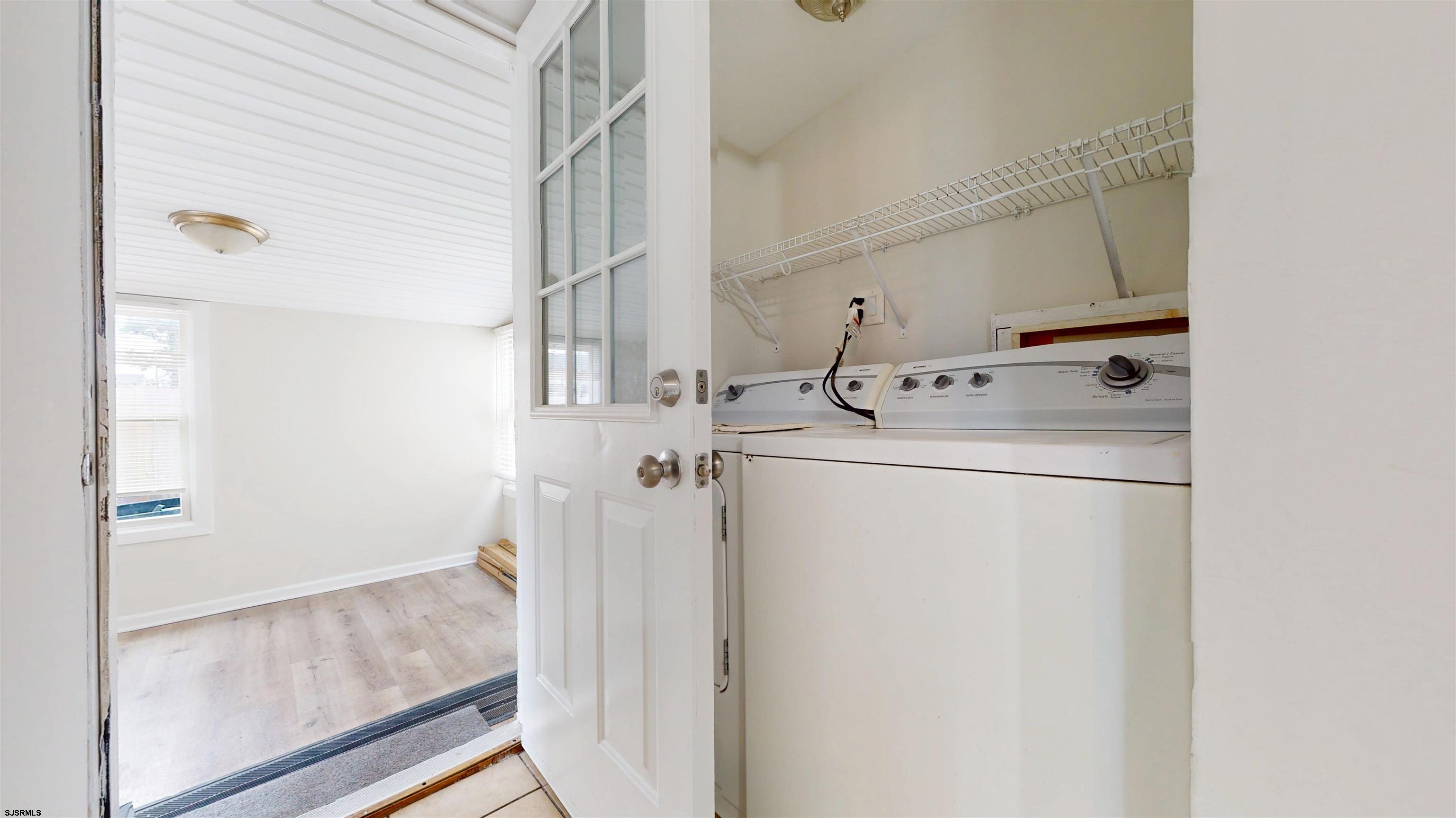 4 East Mill Road Northfield, NJ 08225 - Photo 23 of 49 a utility room with dryer and washer