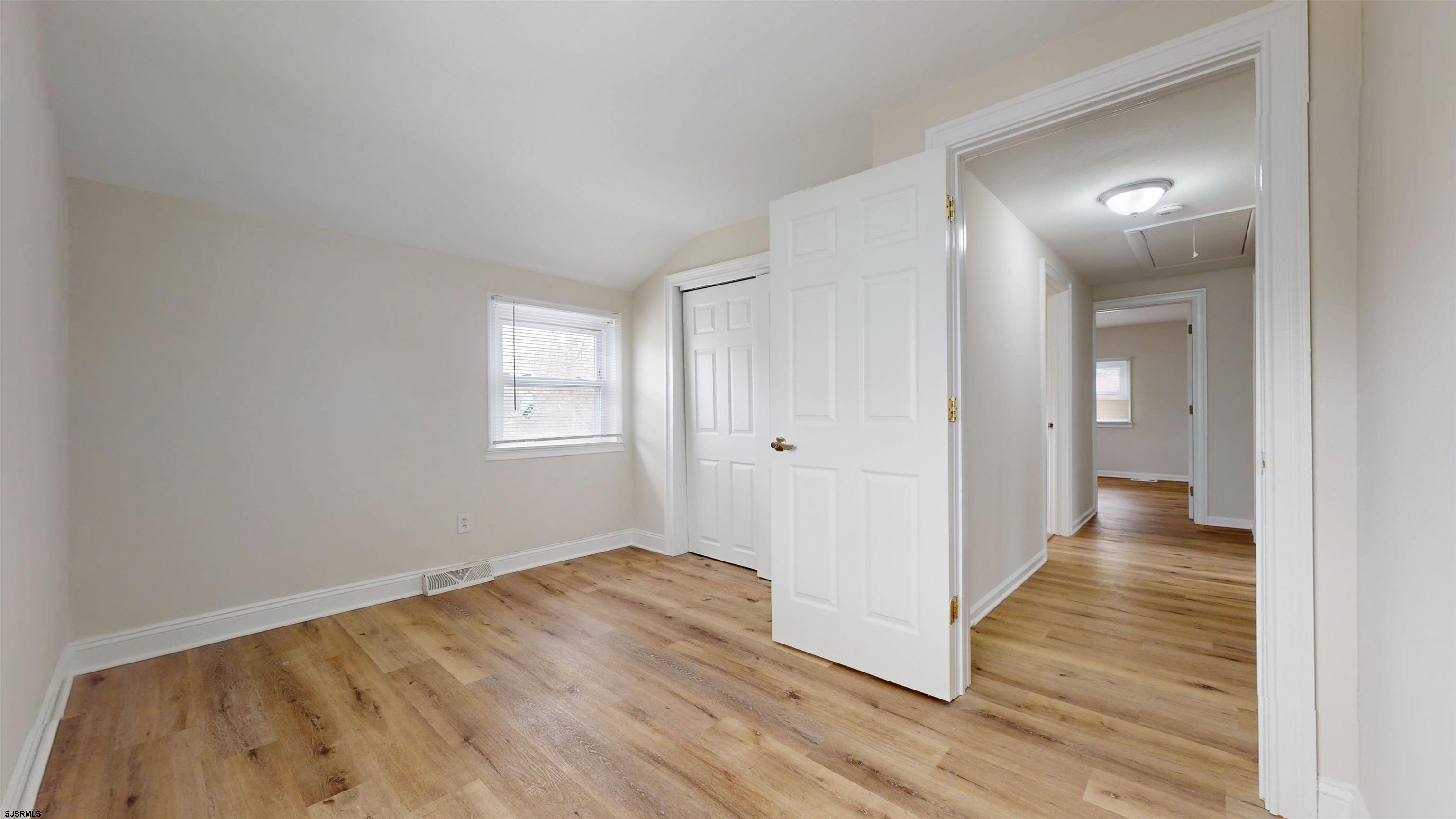 4 East Mill Road Northfield, NJ 08225 - Photo 33 of 49 a view of a hallway with wooden floor