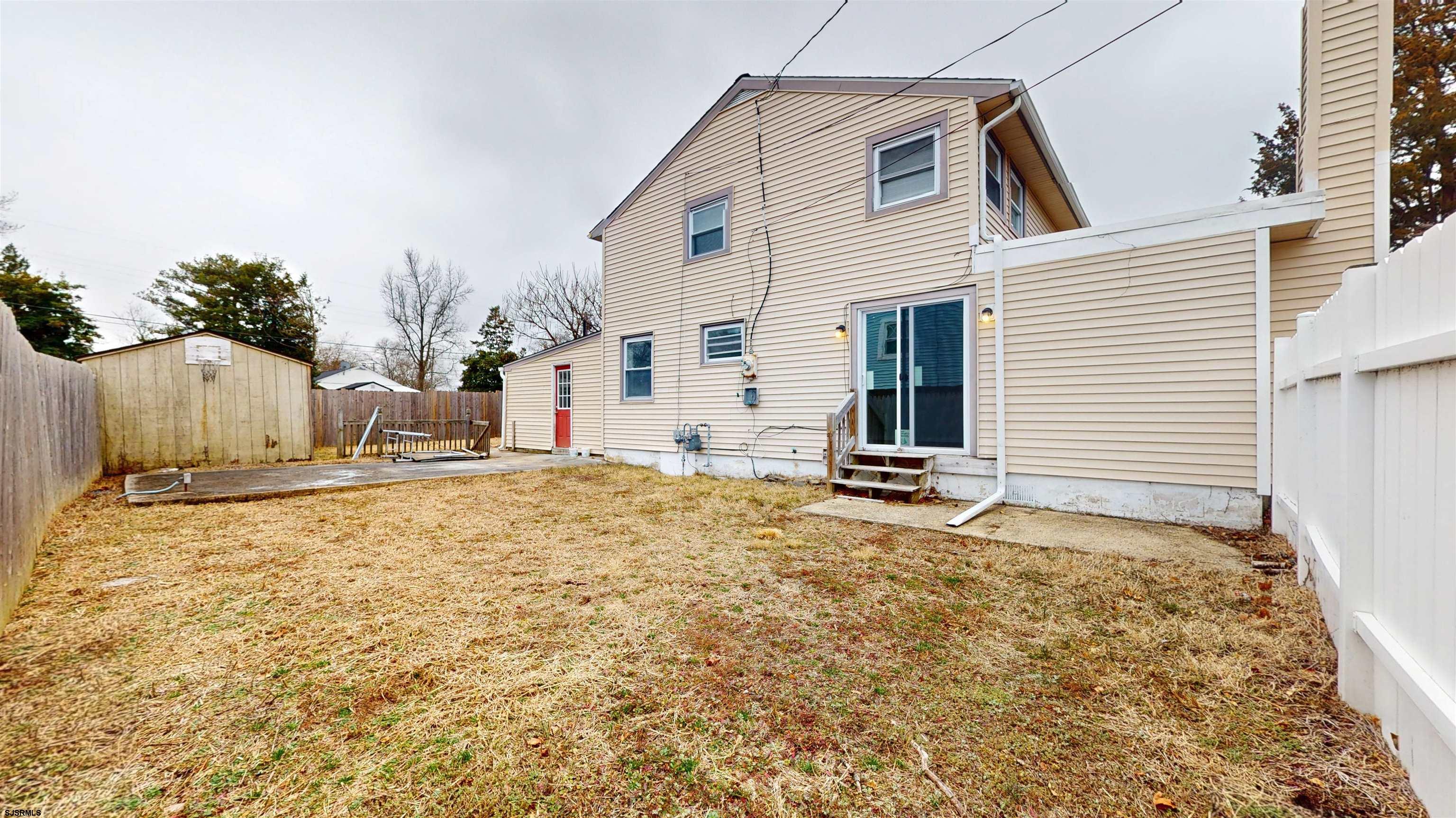 4 East Mill Road Northfield, NJ 08225 - Photo 35 of 49 a view of a house with snow on the road