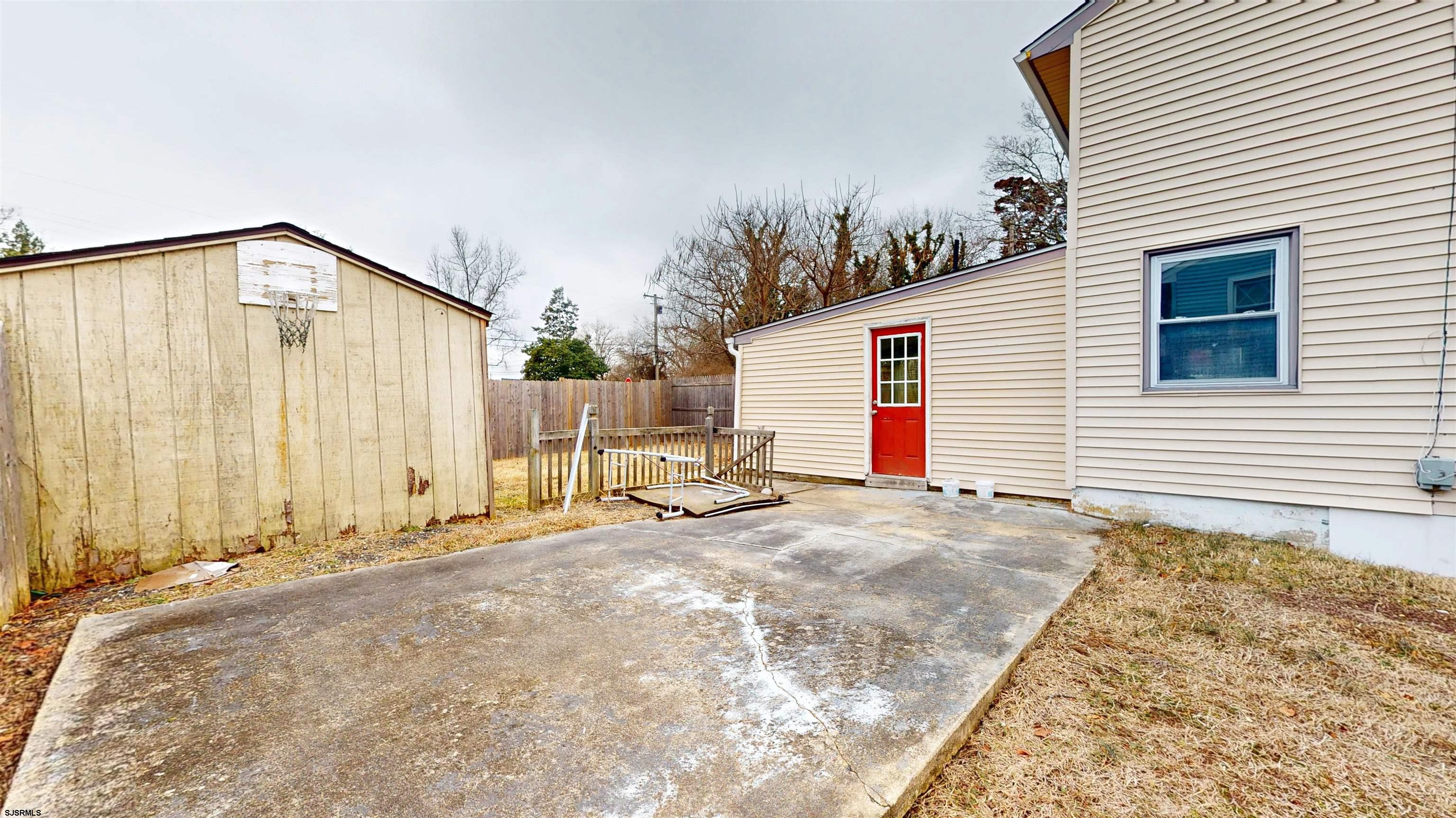 4 East Mill Road Northfield, NJ 08225 - Photo 36 of 49 a view of backyard of house