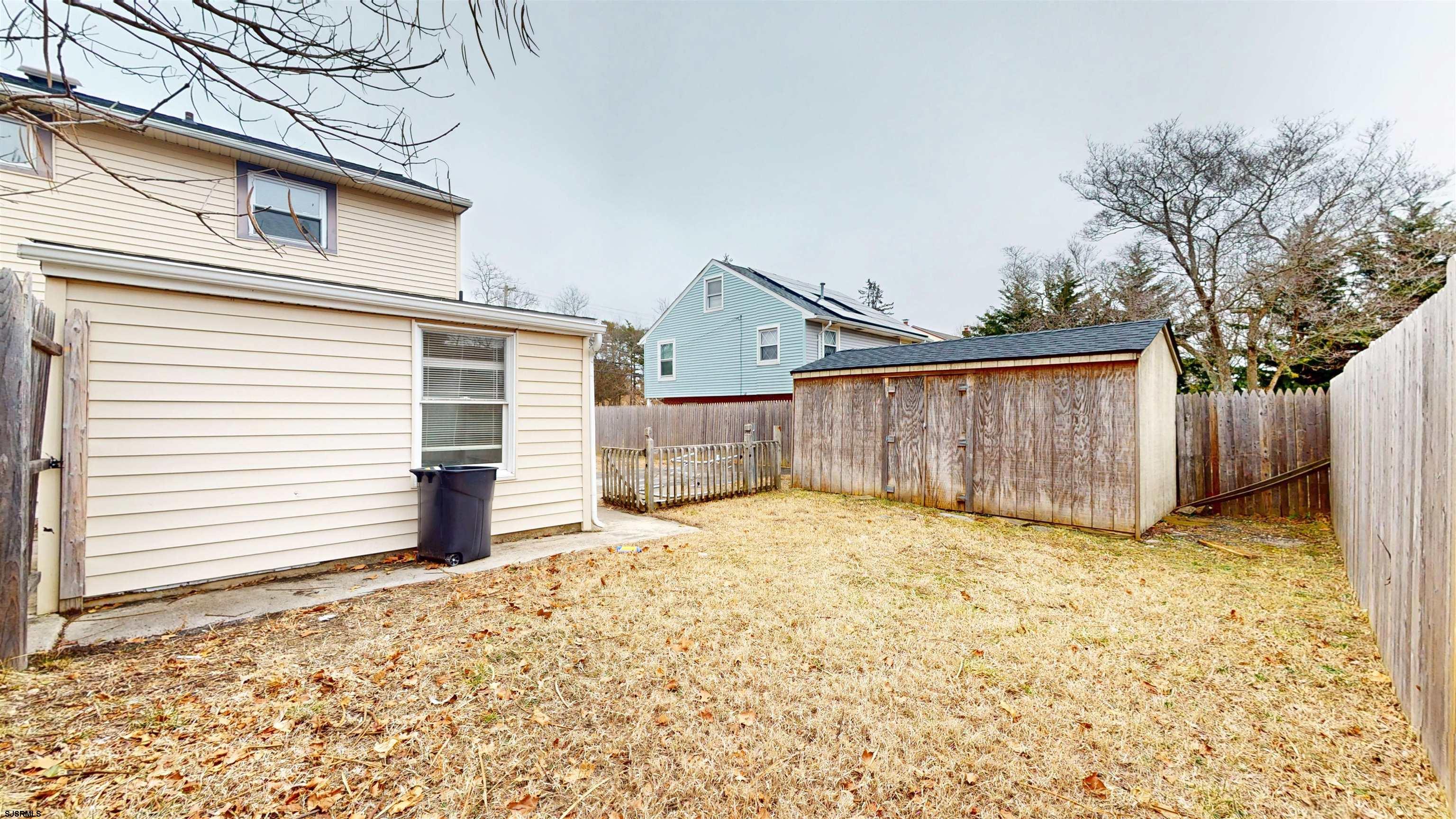 4 East Mill Road Northfield, NJ 08225 - Photo 38 of 49 a view of a backyard of the house