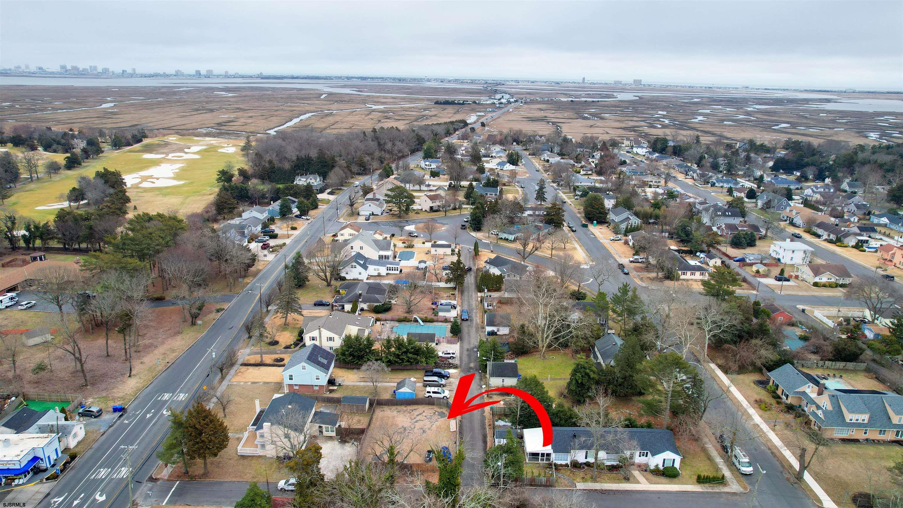 4 East Mill Road Northfield, NJ 08225 - Photo 48 of 49 an aerial view of residential building and lake