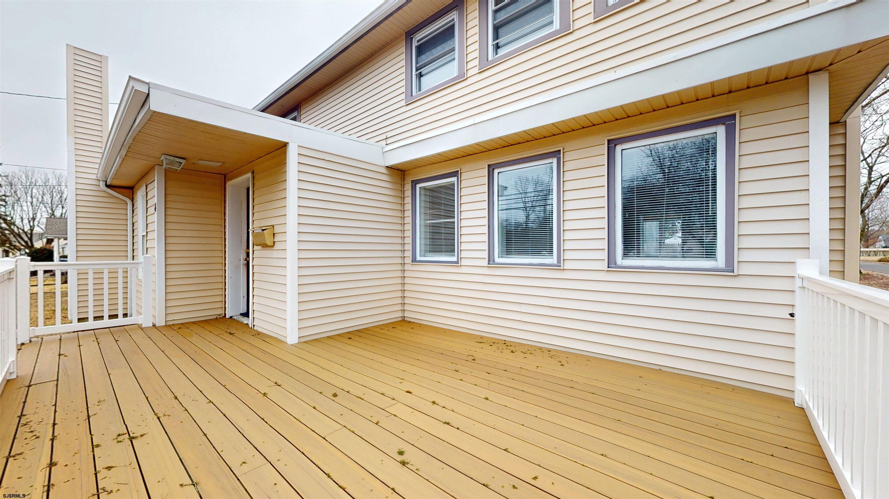 4 East Mill Road Northfield, NJ 08225 - Photo 5 of 49 a view of a wooden deck