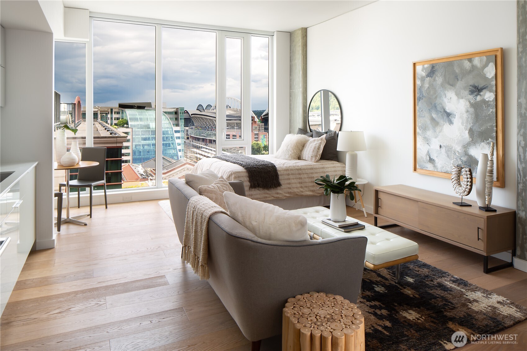 450 South Main Street, Unit 1405 Seattle, WA 98104 - Photo 1 of 38 a living room with furniture and a large window