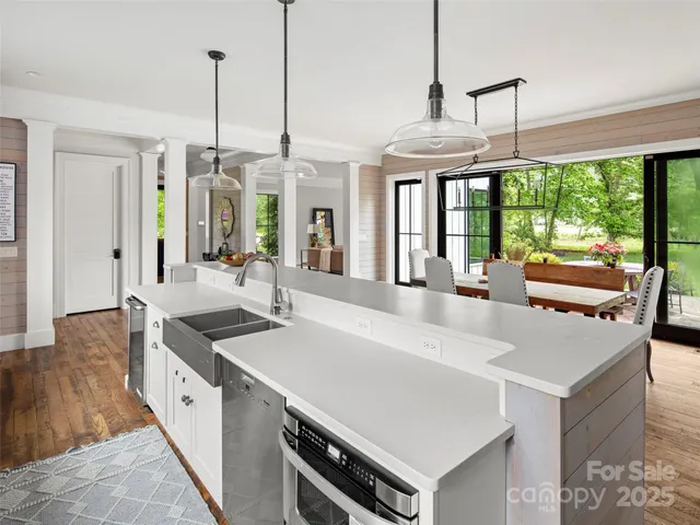 a bathroom with a sink mirror and a bathtub