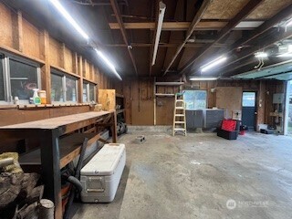 1411 Ruddell Road Southeast Lacey, WA 98503 - Photo 28 of 40 a view of a car garage