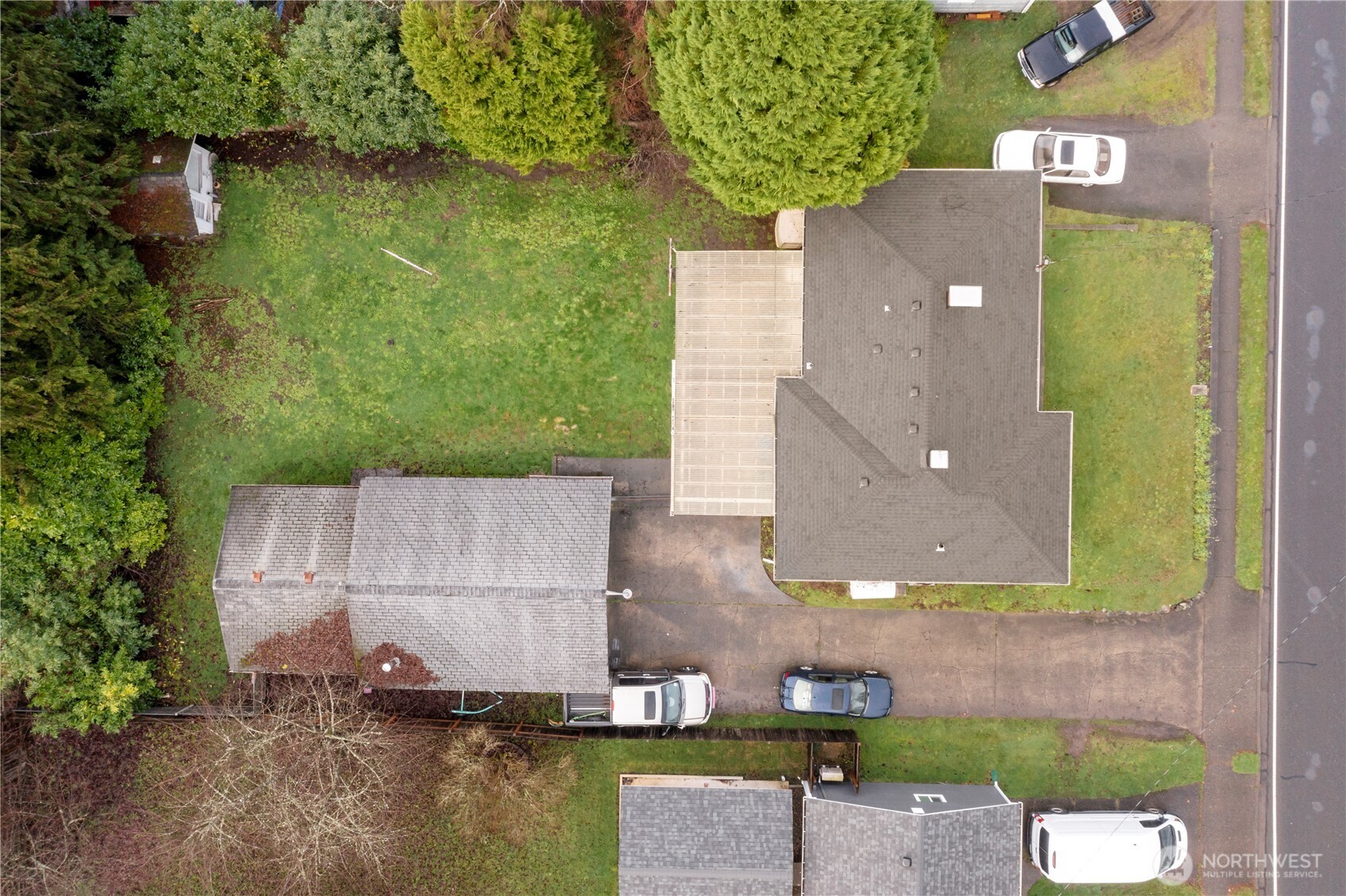 1411 Ruddell Road Southeast Lacey, WA 98503 - Photo 38 of 40 an aerial view of a house with a yard basket ball court and outdoor seating