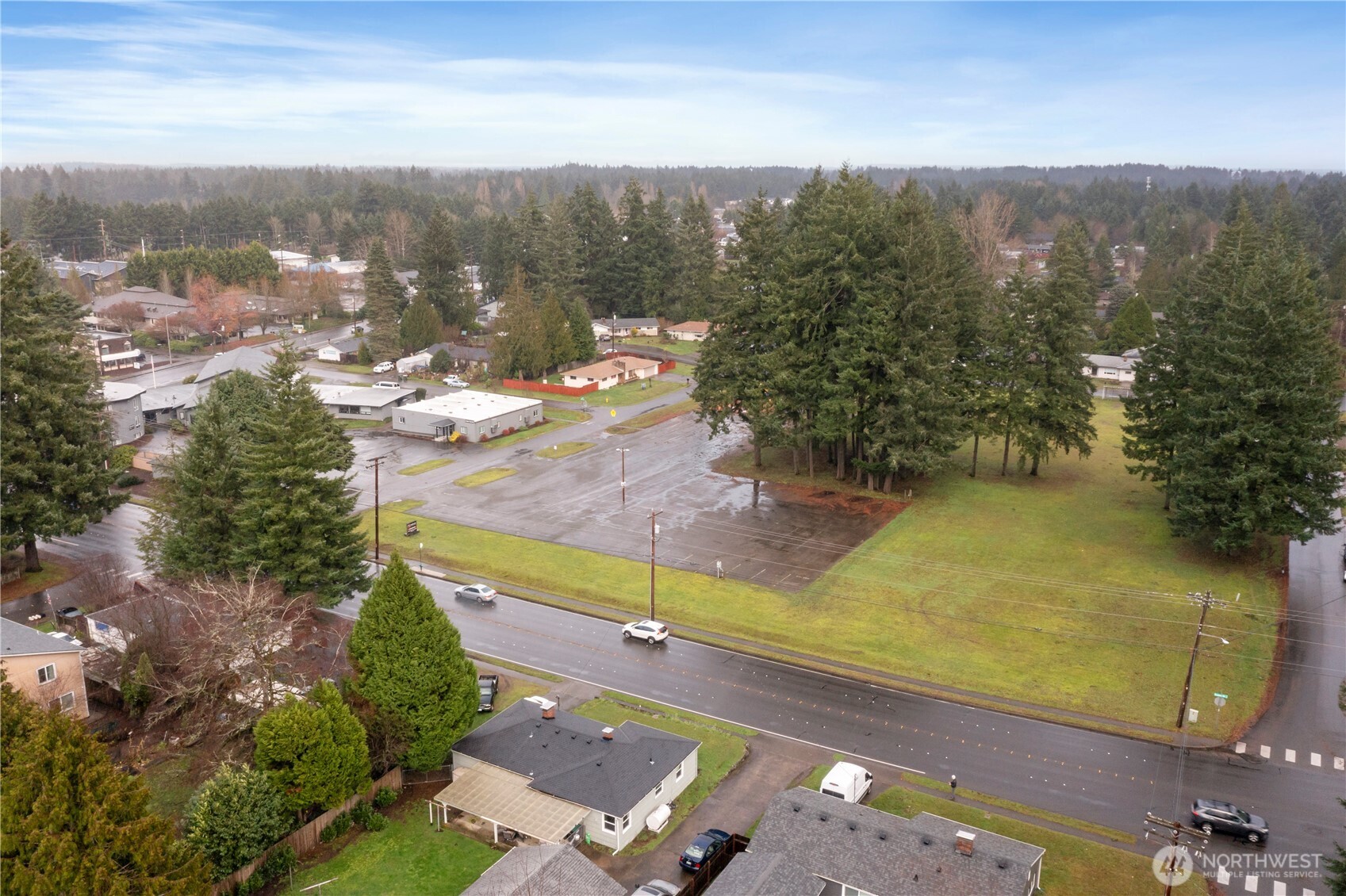 1411 Ruddell Road Southeast Lacey, WA 98503 - Photo 40 of 40 an aerial view of a house with a yard