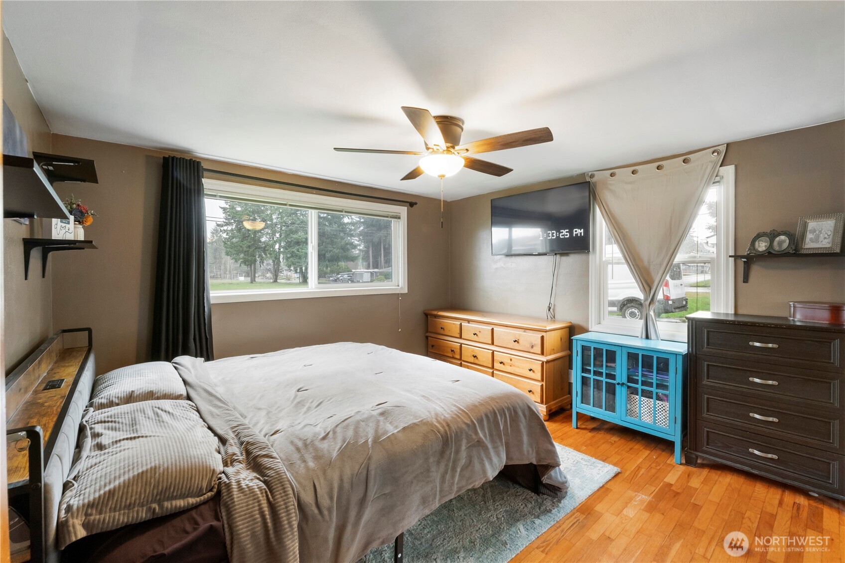 1411 Ruddell Road Southeast Lacey, WA 98503 - Photo 8 of 40 a bedroom with a bed and a dresser