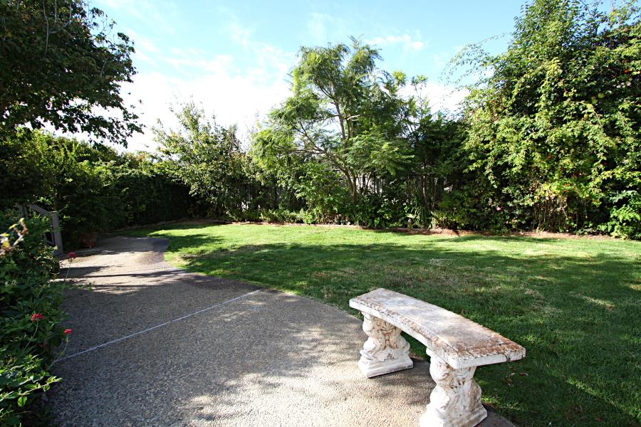 3999 Cherryvale Avenue Soquel, CA 95073 - Photo 15 of 23 a view of a garden with lawn chairs