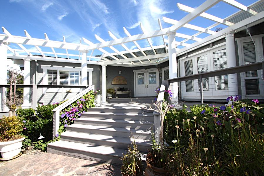 3999 Cherryvale Avenue Soquel, CA 95073 - Photo 4 of 23 a view of path along with retail shop and flowers