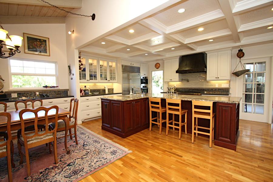 3999 Cherryvale Avenue Soquel, CA 95073 - Photo 9 of 23 a large open kitchen with a table and chairs in it