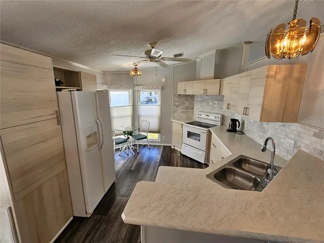 a shelf with cup and plates