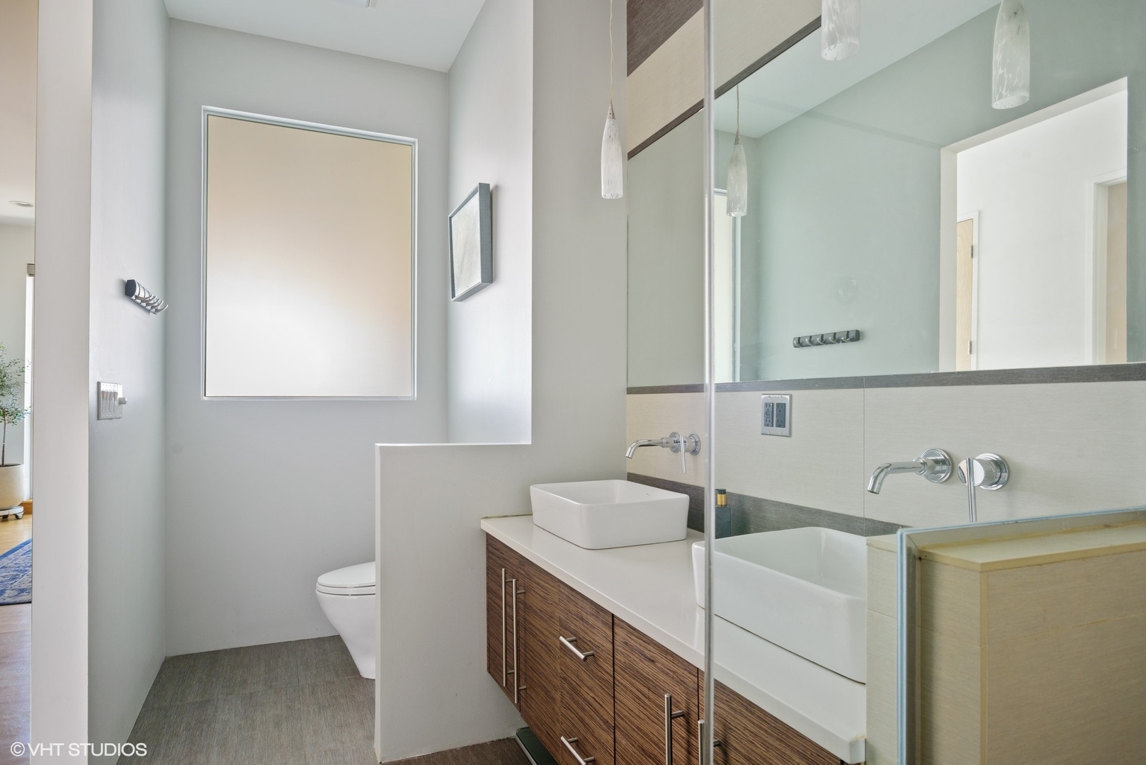 2408 West Rice Street, Unit 203 Chicago, IL 60622 - Photo 11 of 17 a bathroom with a sink and a toilet