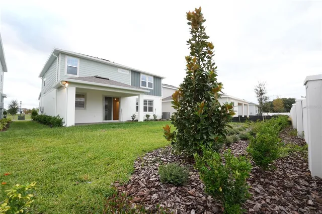 a view of a house with garden