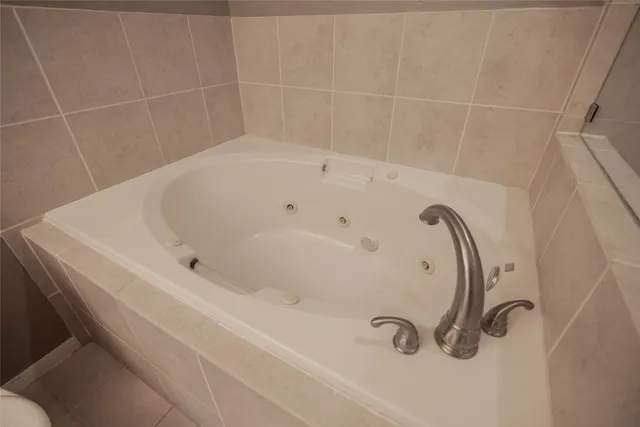 a bathroom with a bathtub