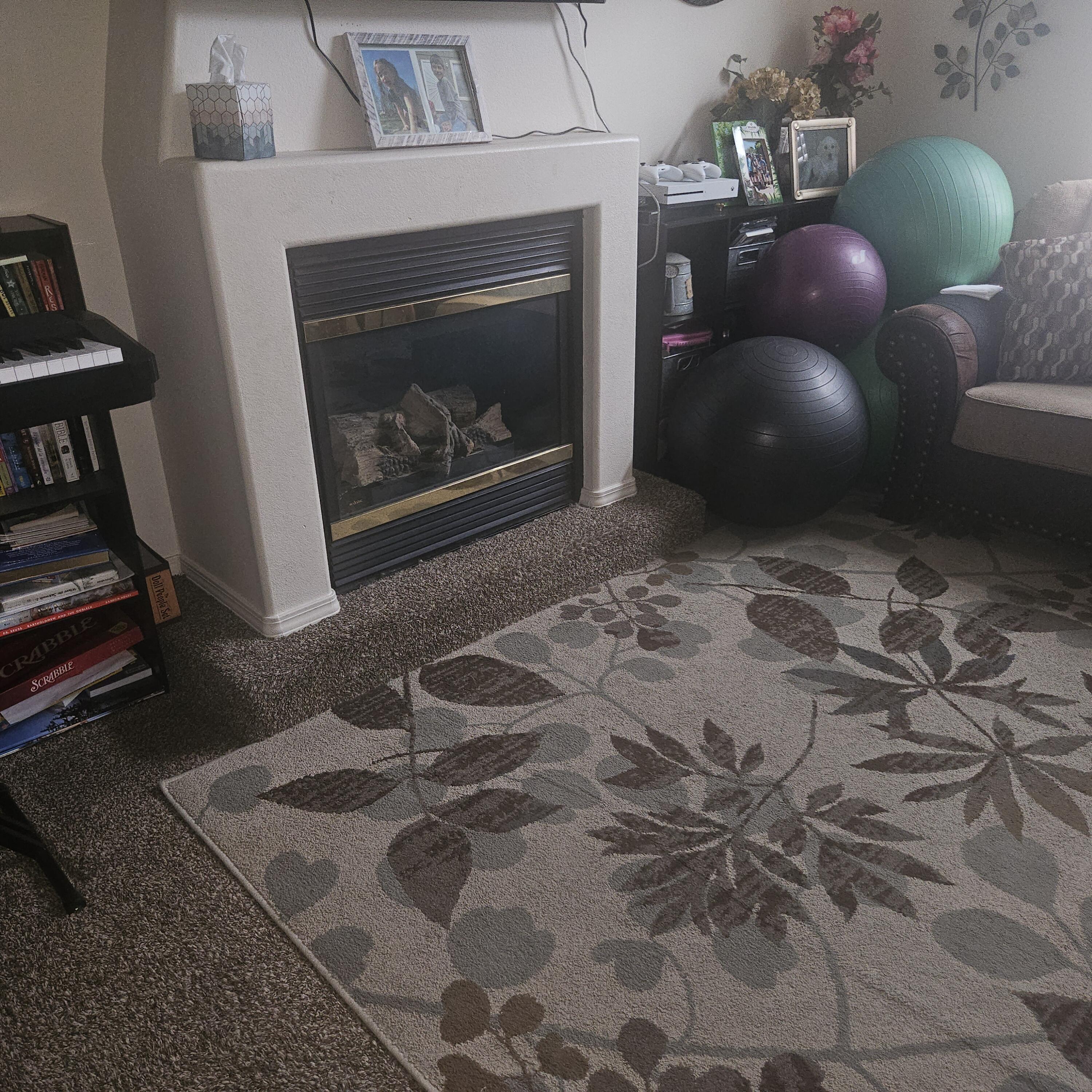 569 Northeast Negus Loop Redmond, OR 97756 - Photo 31 of 32 a living room with furniture and a fireplace