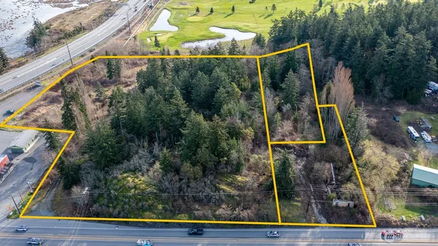 a view of a yard with an outdoor space