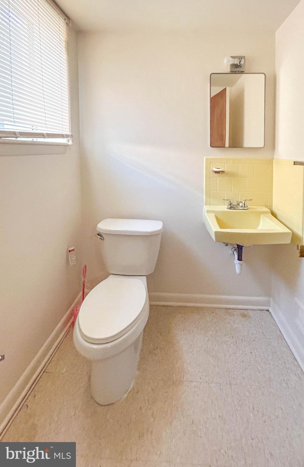 4514 Tapscott Road Pikesville, MD 21208 - Photo 17 of 26 Half Bath