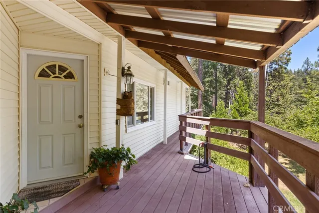 a view of outdoor space with deck and wooden floor