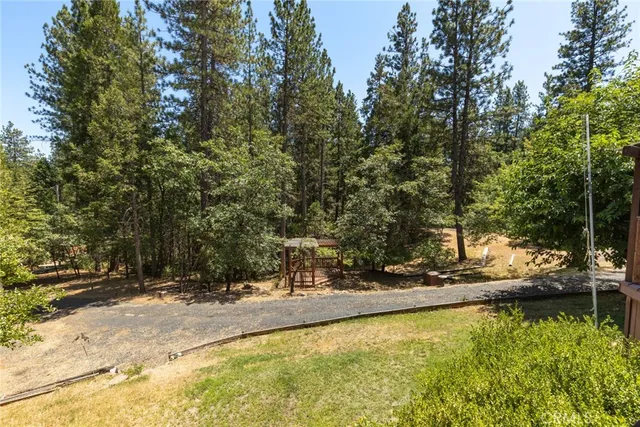 a view of swimming pool with chairs