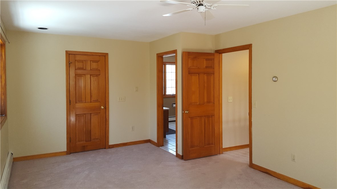 1261 Shannock Road Charlestown, RI 02813 - Photo 13 of 27 masterbedroom view north to master bath with new large shower enclosure and large walk in closet on opposite wall