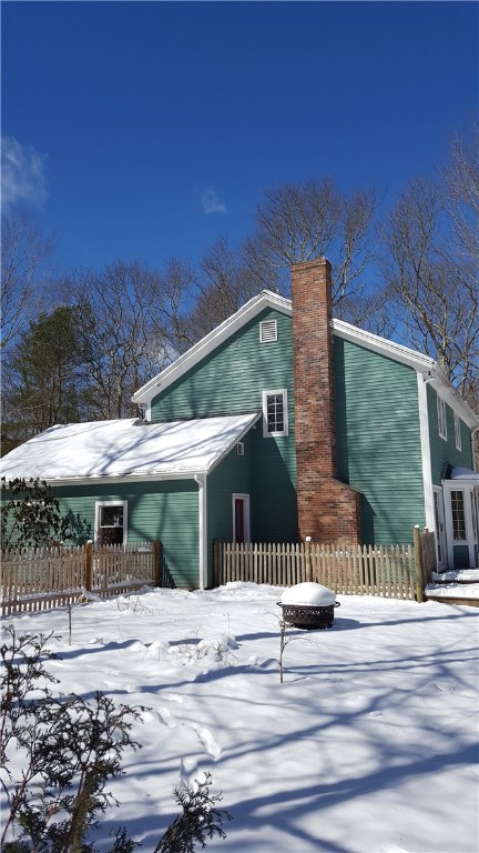 1261 Shannock Road Charlestown, RI 02813 - Photo 22 of 27 right side view, small fenced area extends from garage. could be a puppy run.