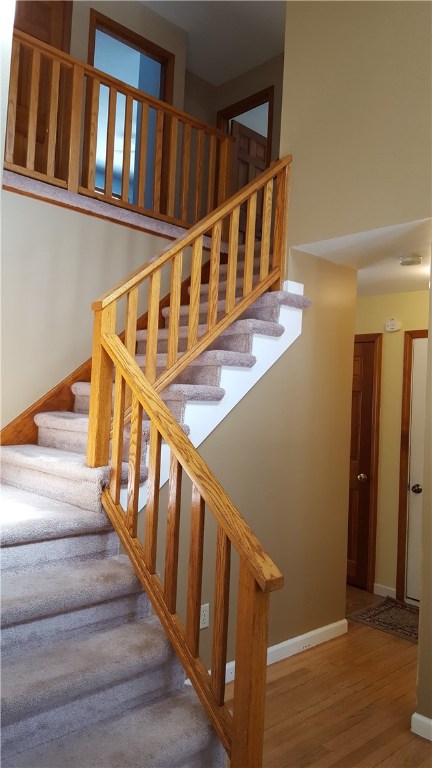 1261 Shannock Road Charlestown, RI 02813 - Photo 9 of 27 entry foyer to stairs to 2nd level.