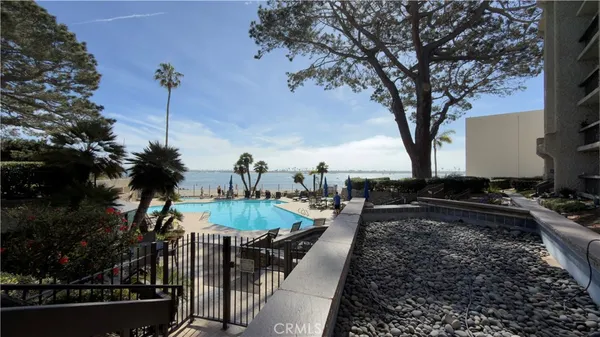 a view of a backyard with sitting area