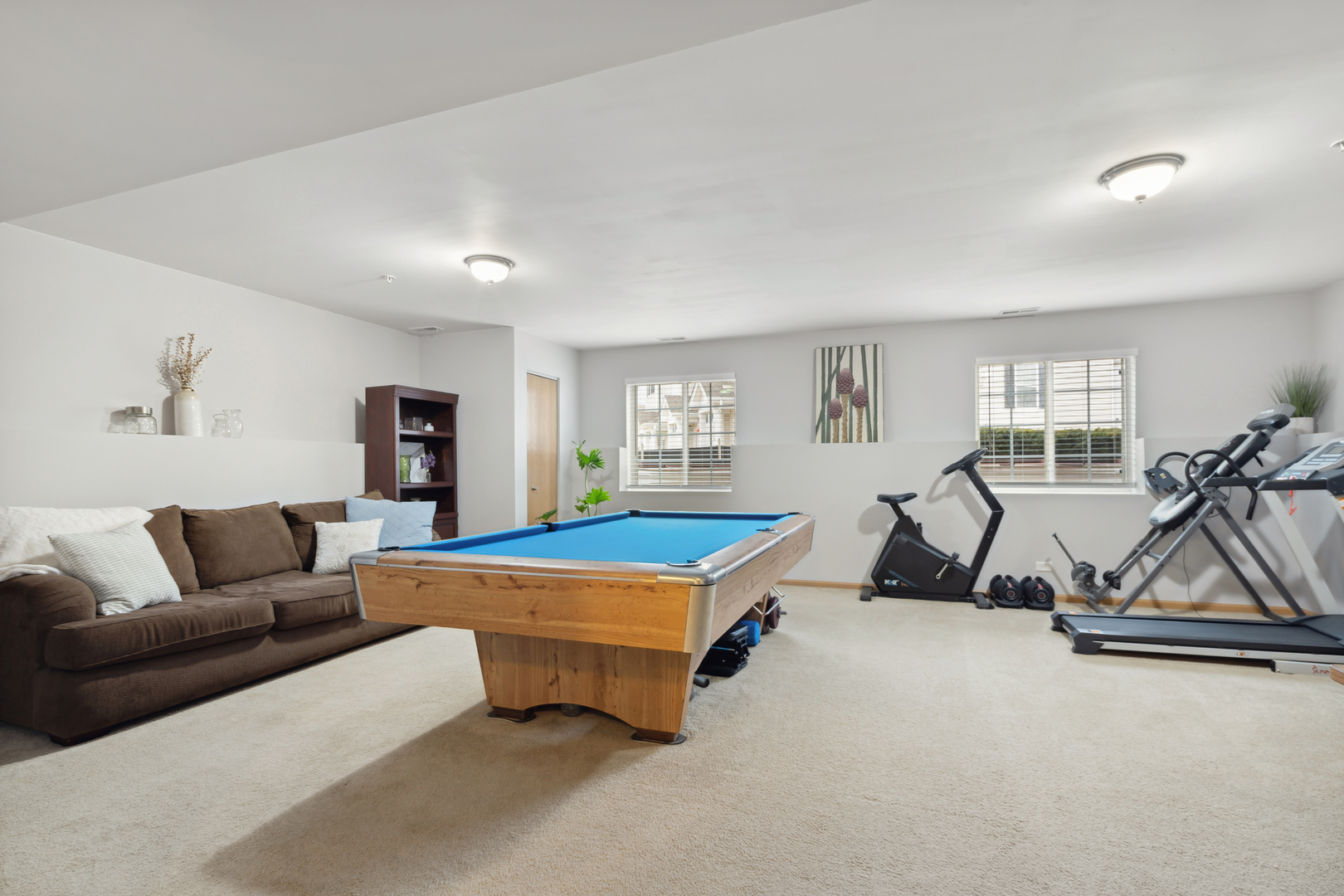 3752 Bailey Road, Unit 3752 Yorkville, IL 60560 - Photo 17 of 20 a living room with furniture a pool table and a large window