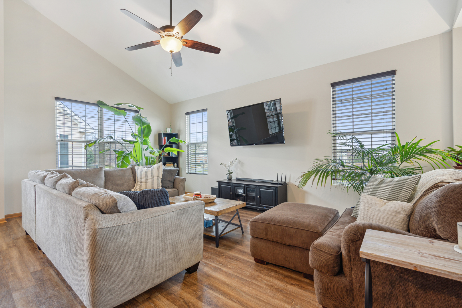 3752 Bailey Road, Unit 3752 Yorkville, IL 60560 - Photo 3 of 20 a living room with furniture and a flat screen tv