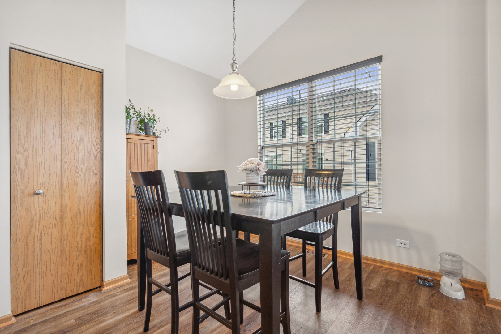 3752 Bailey Road, Unit 3752 Yorkville, IL 60560 - Photo 5 of 20 a view of a dining room with furniture window and wooden floor