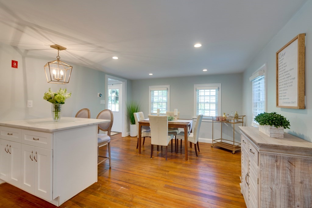 240 Summer Street Walpole, MA 02071 - Photo 14 of 34 a view of a dining room with furniture and wooden floor