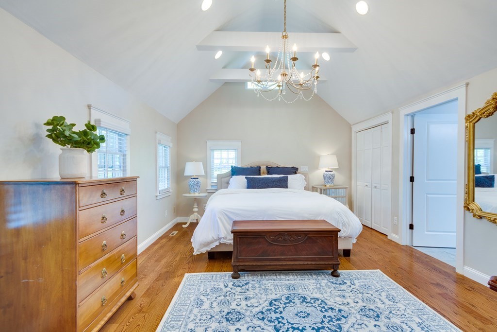 240 Summer Street Walpole, MA 02071 - Photo 16 of 34 a spacious bedroom with a bed and a dresser