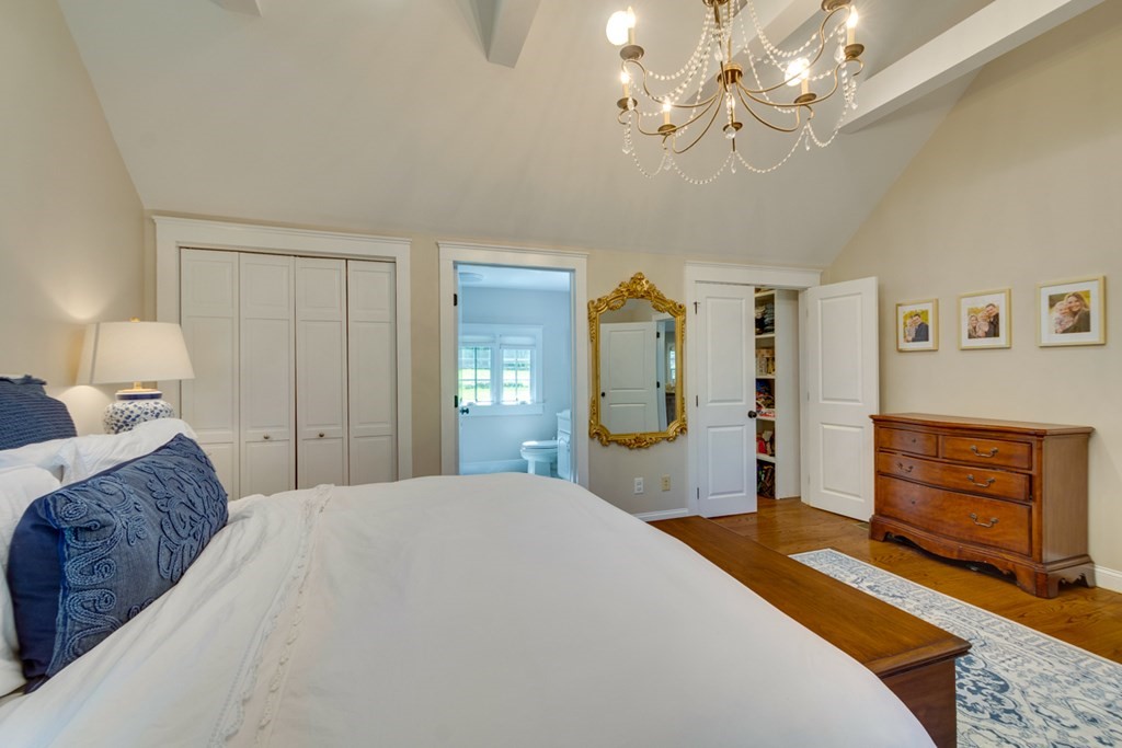 240 Summer Street Walpole, MA 02071 - Photo 18 of 34 a bedroom with a bed and a dresser