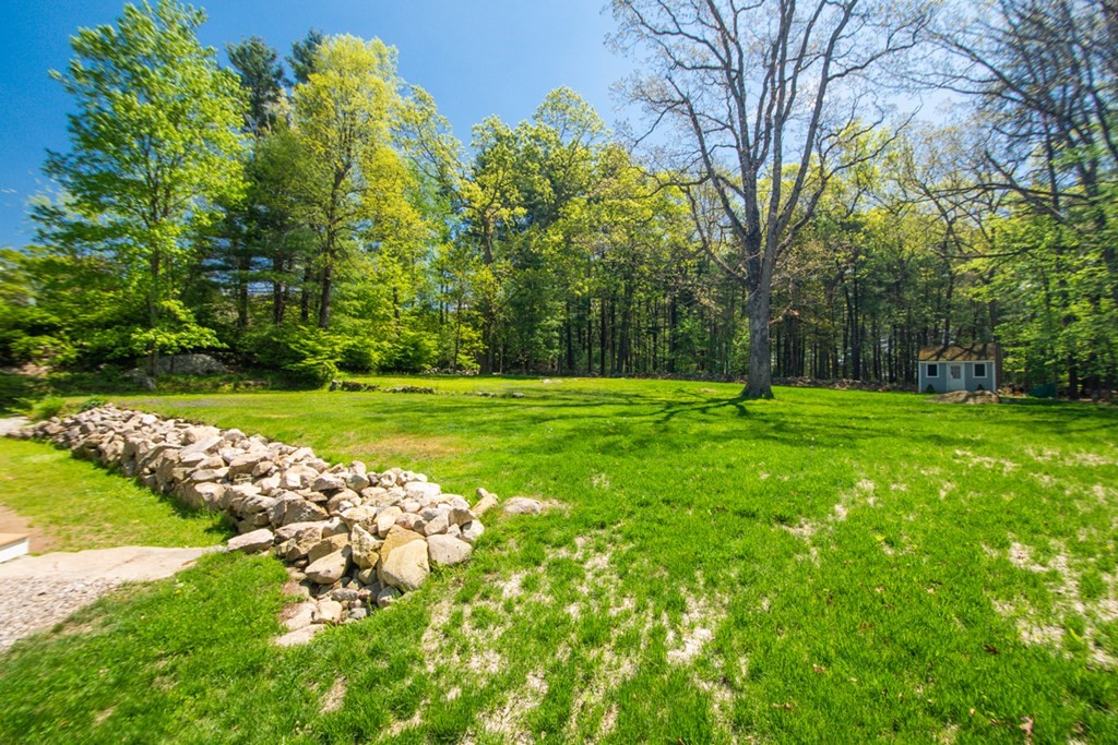 240 Summer Street Walpole, MA 02071 - Photo 30 of 34 a view of a golf course with a lake