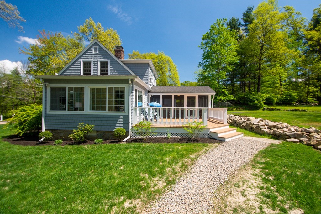 240 Summer Street Walpole, MA 02071 - Photo 31 of 34 a front view of a house with garden and porch