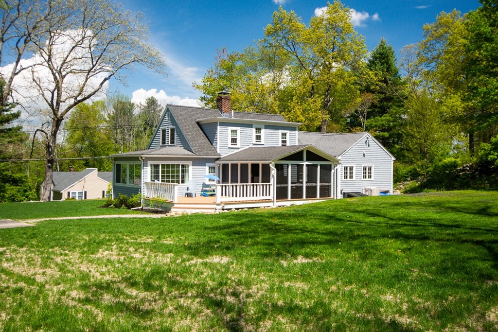 240 Summer Street Walpole, MA 02071 - Photo 33 of 34 a front view of a house with a garden