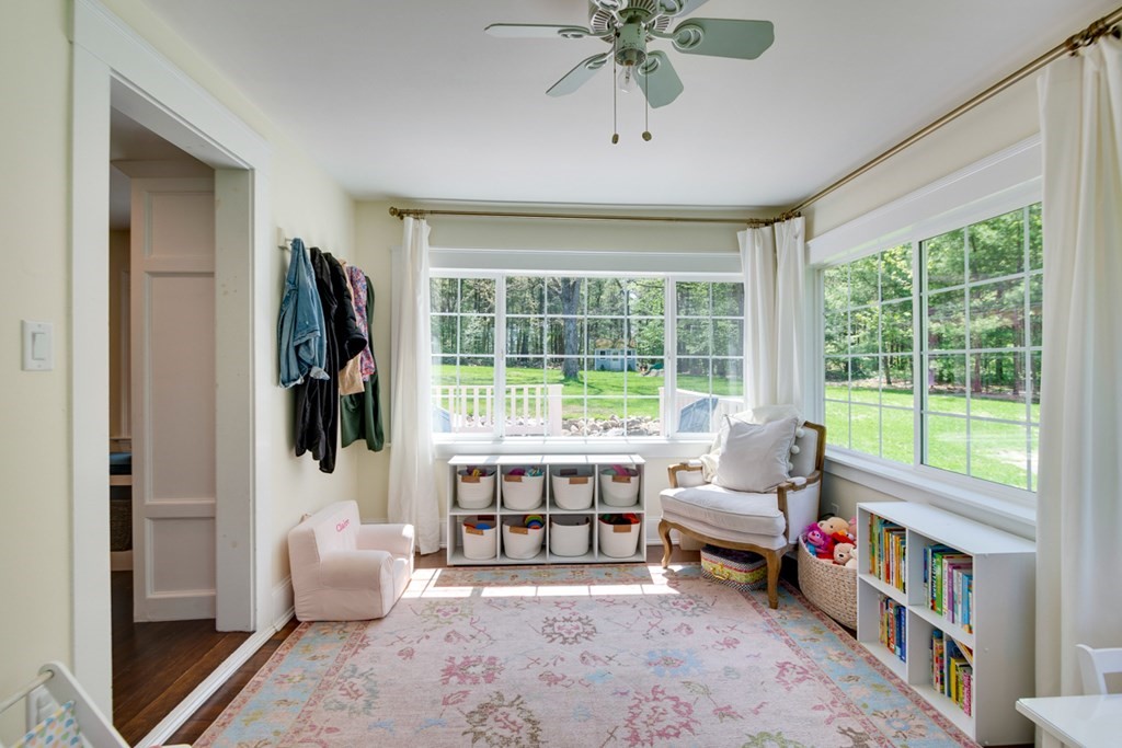 240 Summer Street Walpole, MA 02071 - Photo 8 of 34 a living room with furniture and a large window