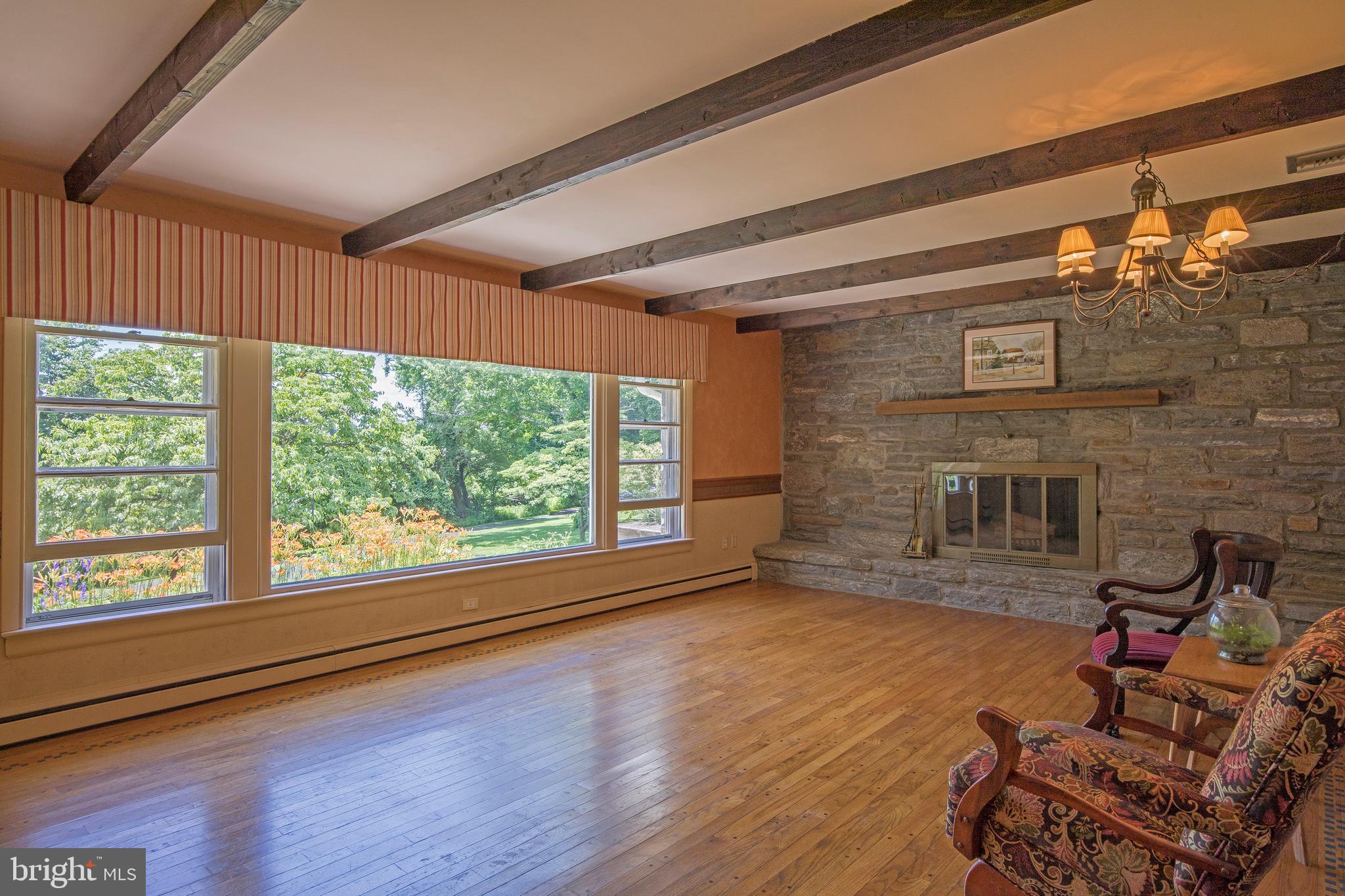 975 Limekiln Road Doylestown, PA 18901 - Photo 21 of 47 Living Room with wood burning Fireplace